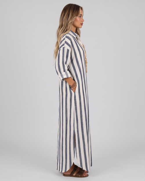 Women's navy and cream striped shirt dress, maxi length with a collar and long sleeves, side view