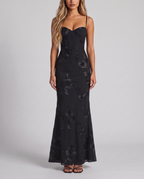 Women's black floral embroidered corset maxi dress with a fishtail skirt, front view