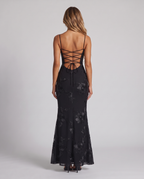 Women's black floral embroidered corset maxi dress with a fishtail skirt, back view