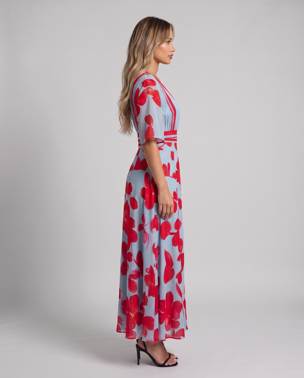 Women's light blue floral maxi dress with a V-neck wrap bodice and red trim, side view
