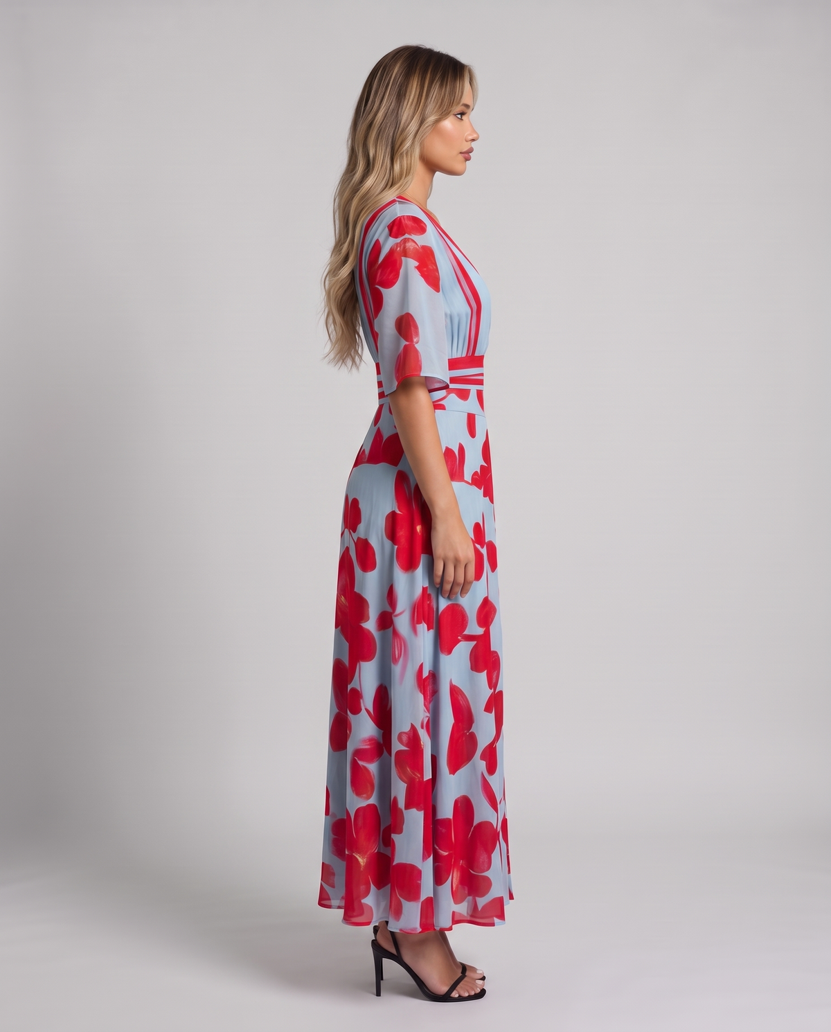 Women's light blue floral maxi dress with a V-neck wrap bodice and red trim, side view