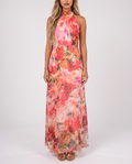 Women's coral pink floral halter neck maxi dress with a floaty A-line skirt, front view