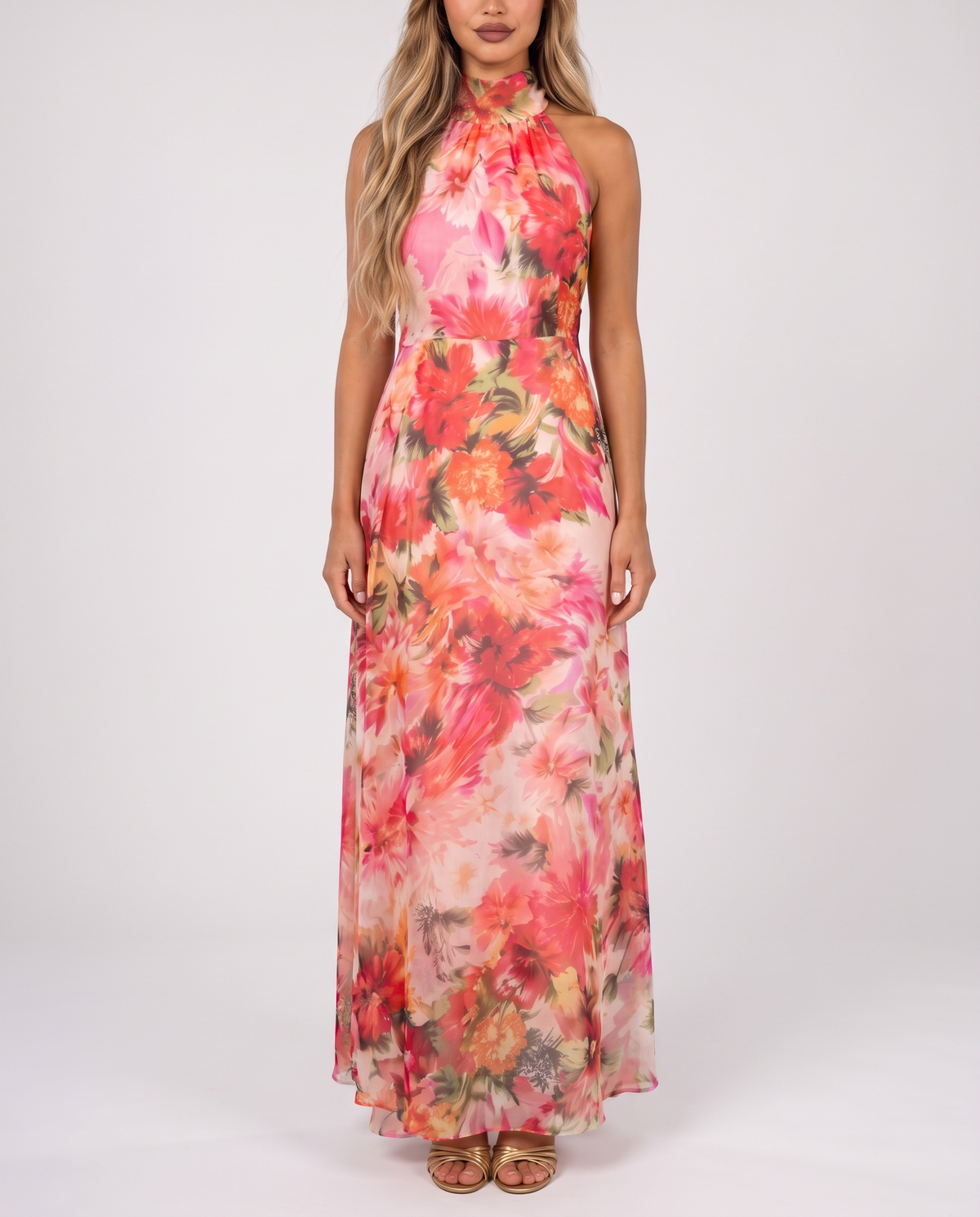 Women's coral pink floral halter neck maxi dress with a floaty A-line skirt, front view