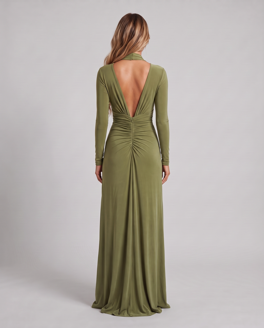 Women's olive green long sleeve maxi dress with a plunge V-neck and open back, back view