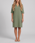 Women's sage green knee length shift dress with a notched neckline and elbow sleeves, front view